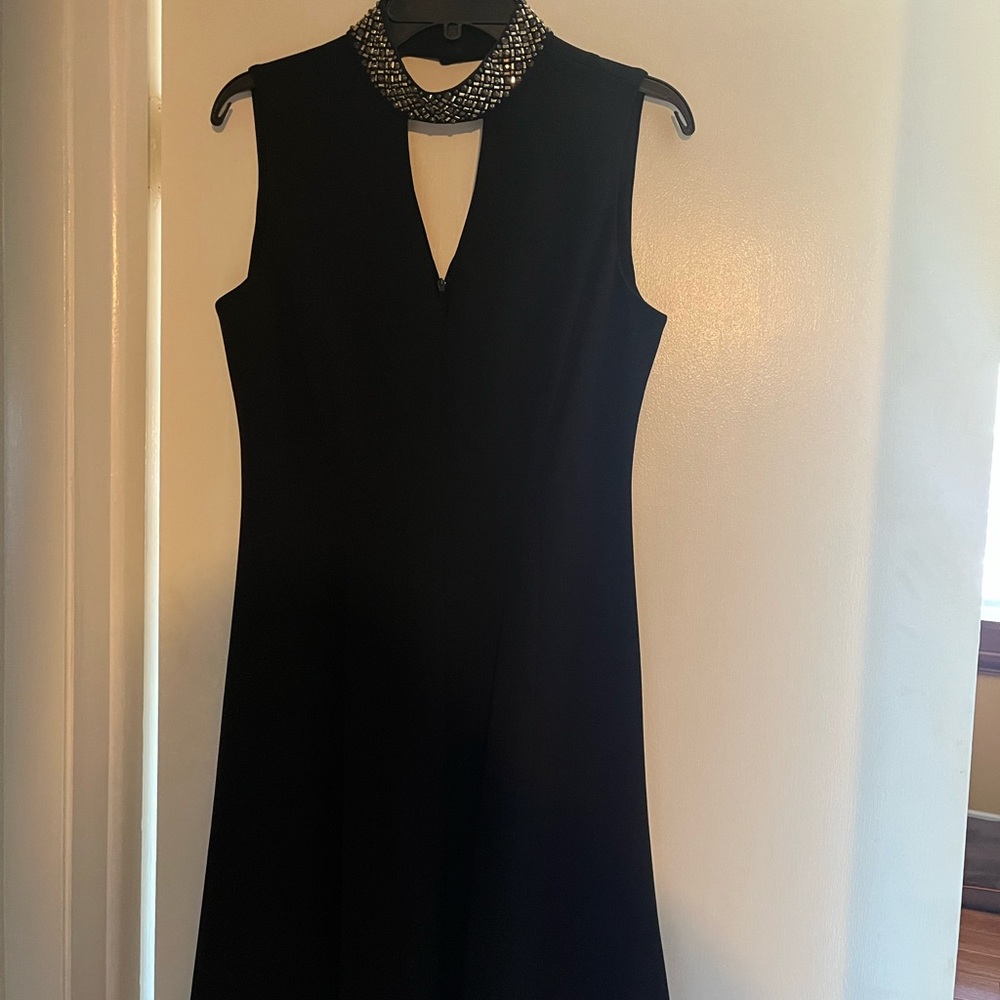 Calvin Klein cocktail dress. Very flattering A-line skirt. Excellent condition.